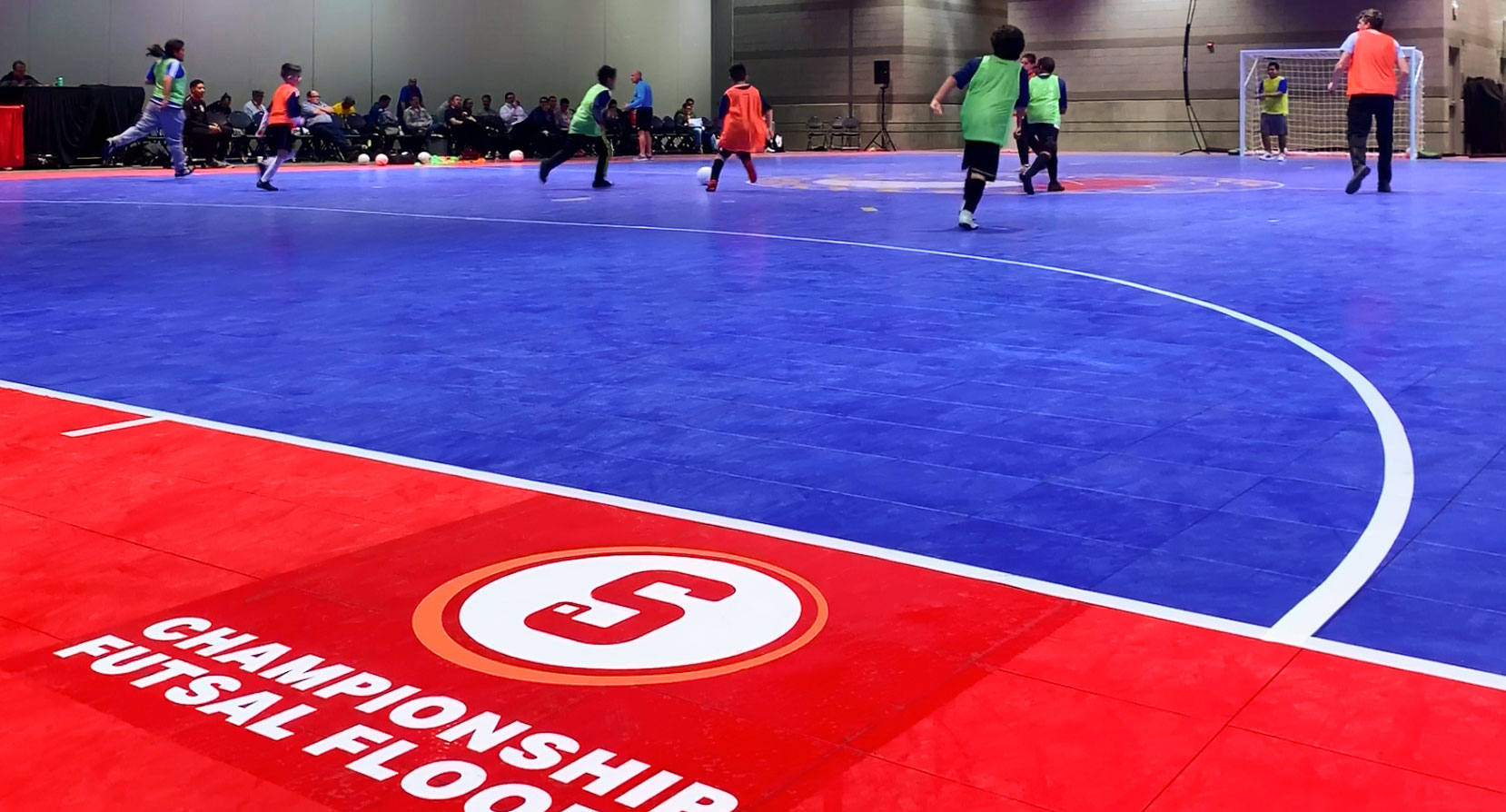 Futsal players on SnapSports Championship Futsal Flooring