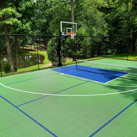 Green outdoor multi-court with blue accents