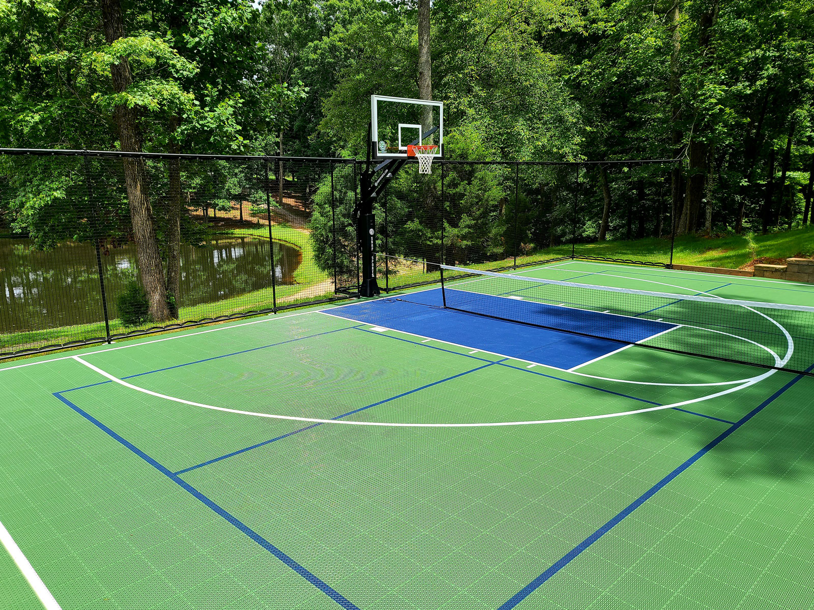 Green outdoor multi-court with blue accents