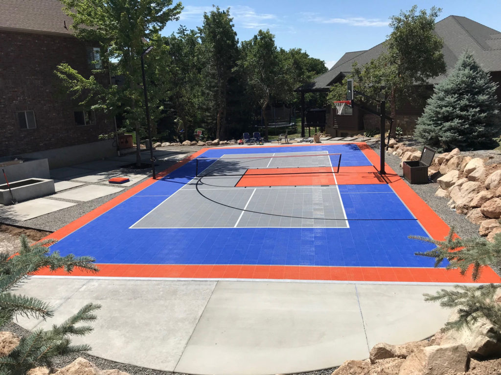 35' x 64' Orange, bright blue and gray multi-court in an Ogden backyard