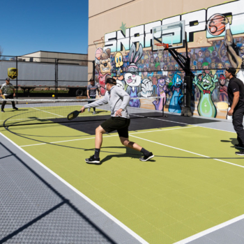 Pickleball players continue their game on the Outdoor Revolution PS Pickleball Surfacing
