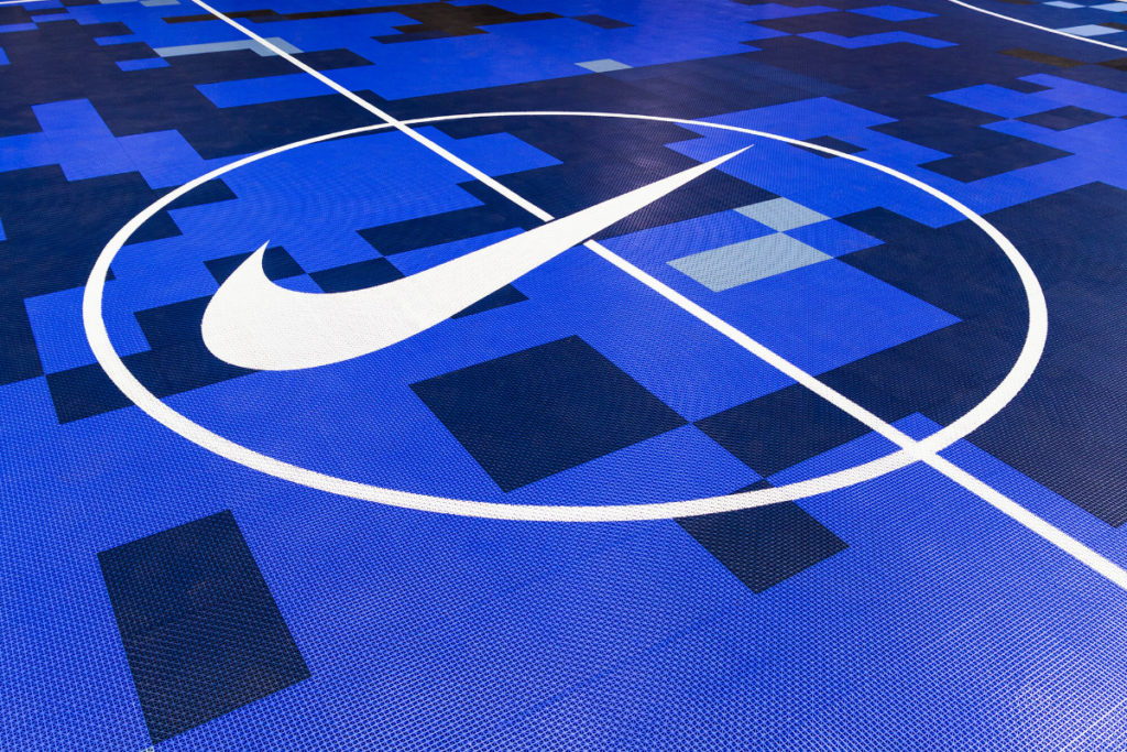 Detail of the Sole DXB Camo court's custom logo painting