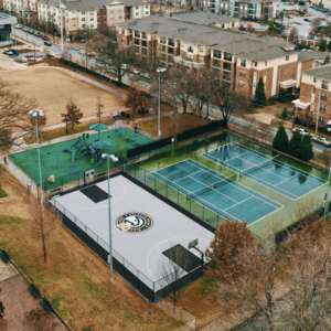 Drone shot of the new basketball court next to the tennis courts and playground