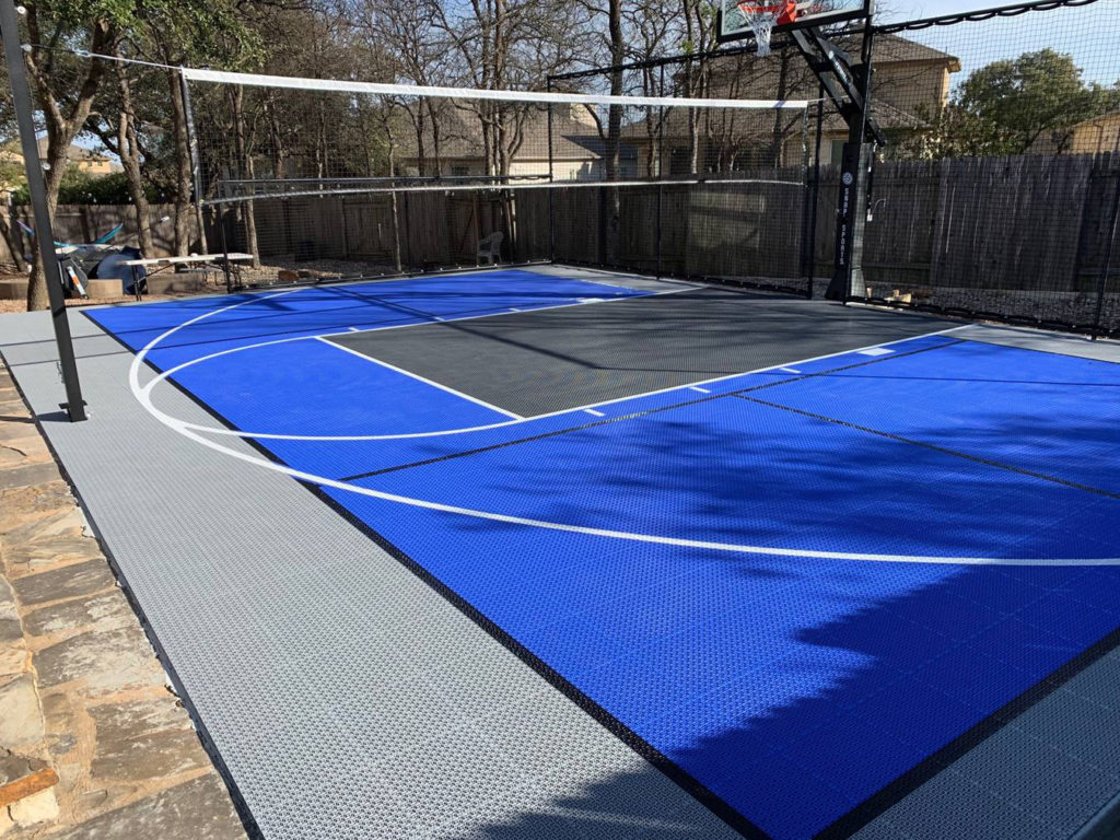 Outdoor Revolution backyard multi-court in gray, bright blue and graphite