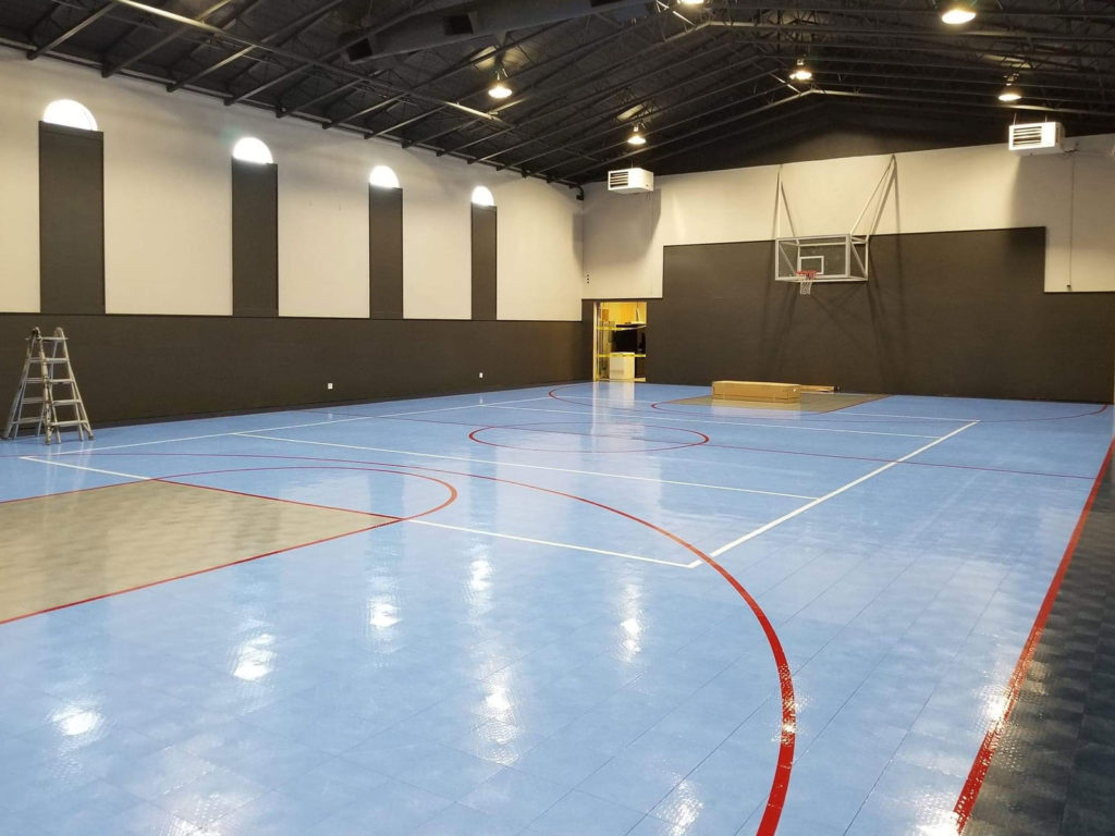 Steel blue indoor multi-court with gray keys
