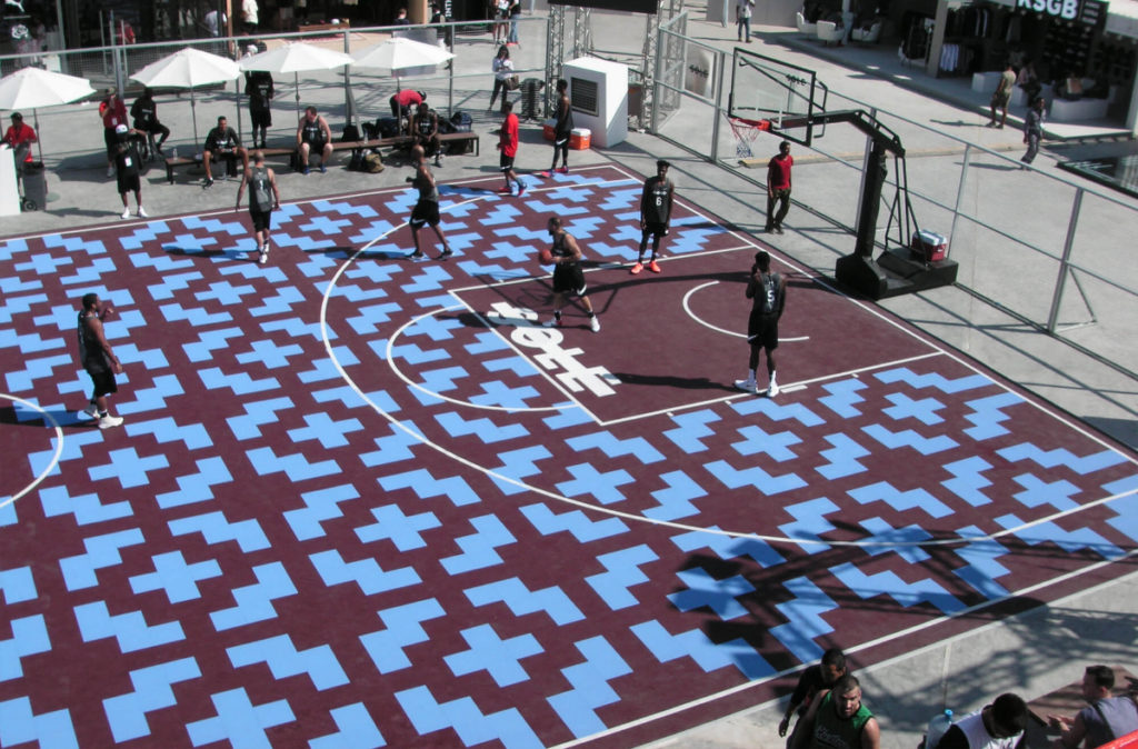 Overhead view of the sky blue and burgundy 2016 Sole Ball Above All Court in Dubai