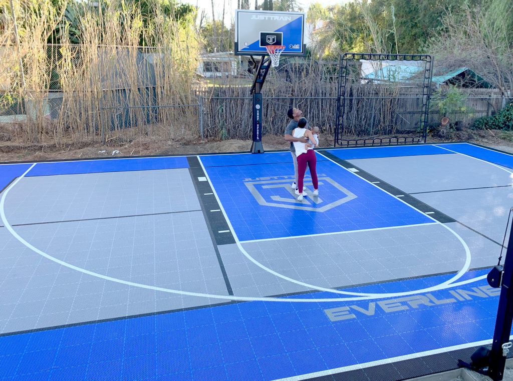 Outdoor Revolution backyard multi-court with custom logos