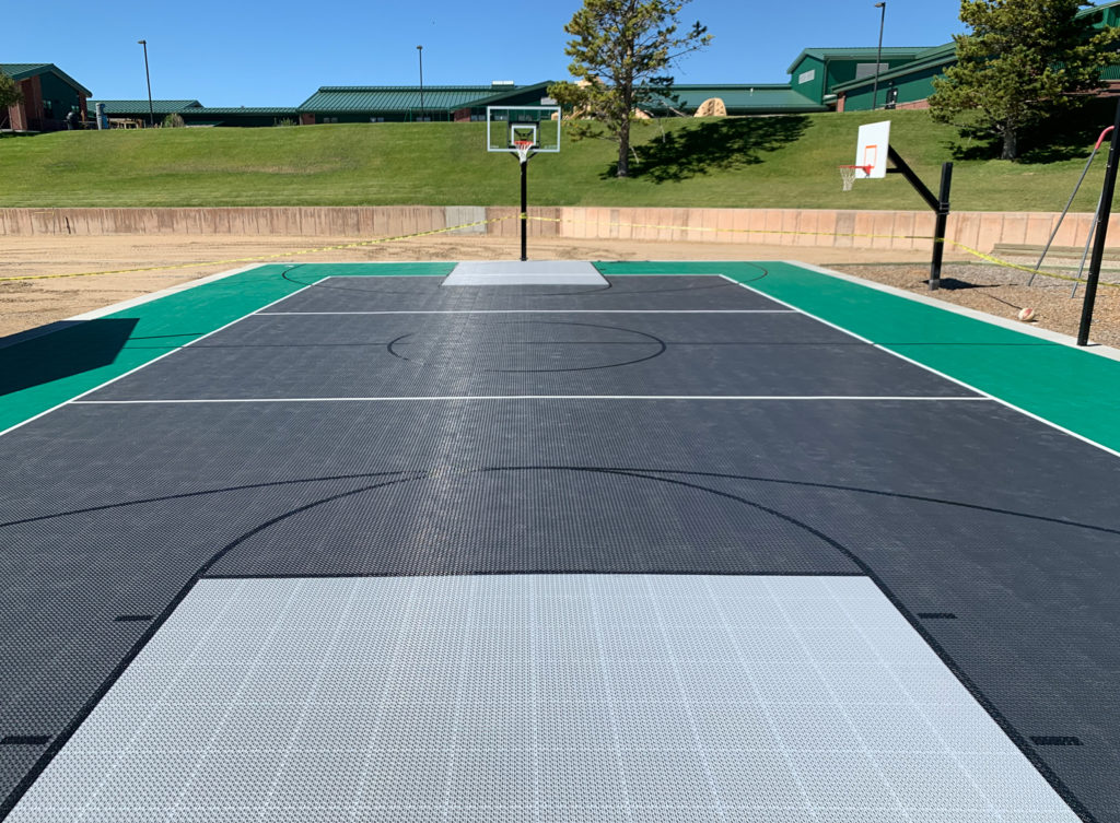 Green, graphite and gray outdoor full multi-court with Outdoor Revolution