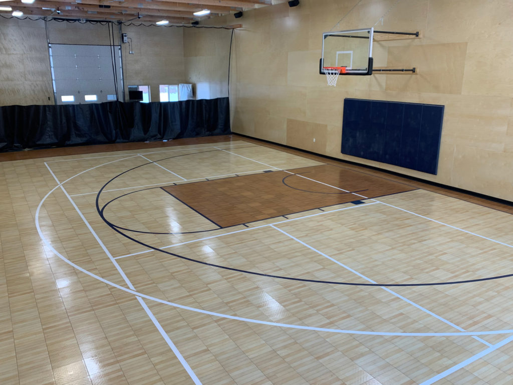 Indoor multi-court with maple and dark maple Revolution flooring