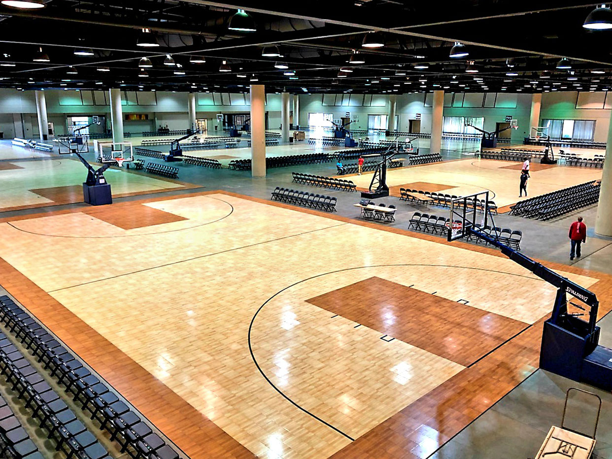 Revolution with TuffShield maple and dark maple indoor basketball courts