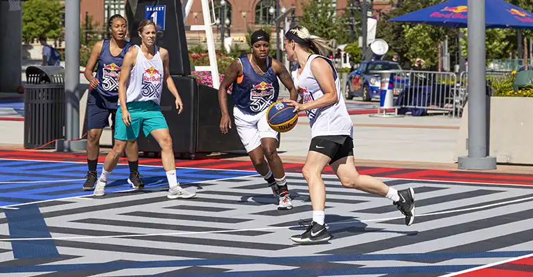 commercial basketball courts Women participate in a Red Bull 3X Basketball tournament