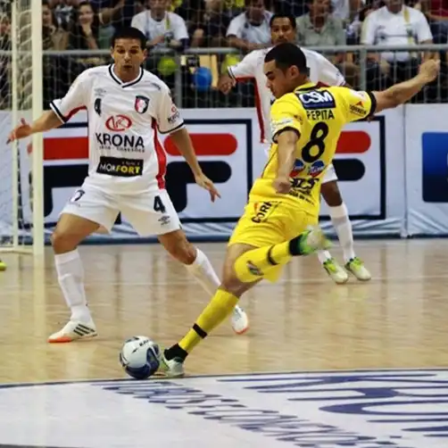 futsal durability A futsal player kicks for a goal in a match on Indoor Revolution.