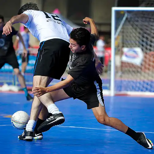 futsal gym Two men play futsal on SnapSports Gym flooring